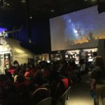 Shaesta Waiz speaks to a middle school girls at the Smithsonian.