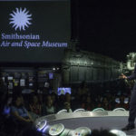 Shaesta Waiz speaks to a middle school girls at the Smithsonian National Air & Space Museum.
