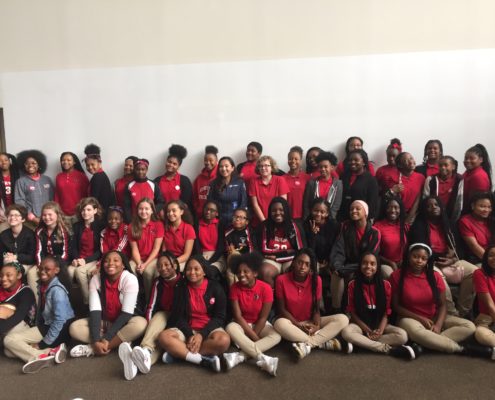 Shaesta Waiz speaks to a middle school girls at the Smithsonian National Air & Space Museum.