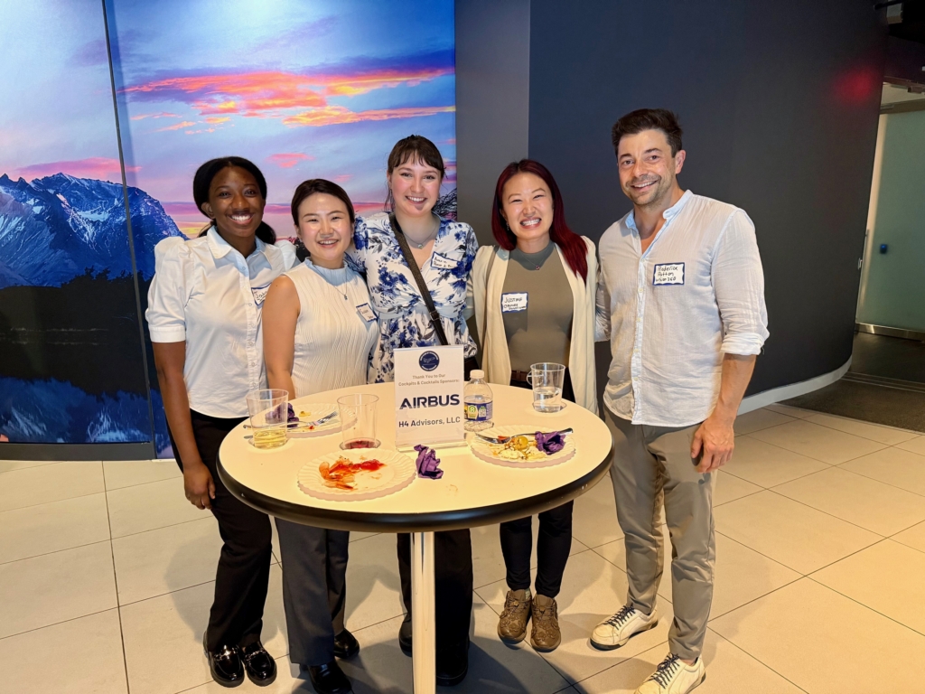 Young professionals at a Runway Program event
